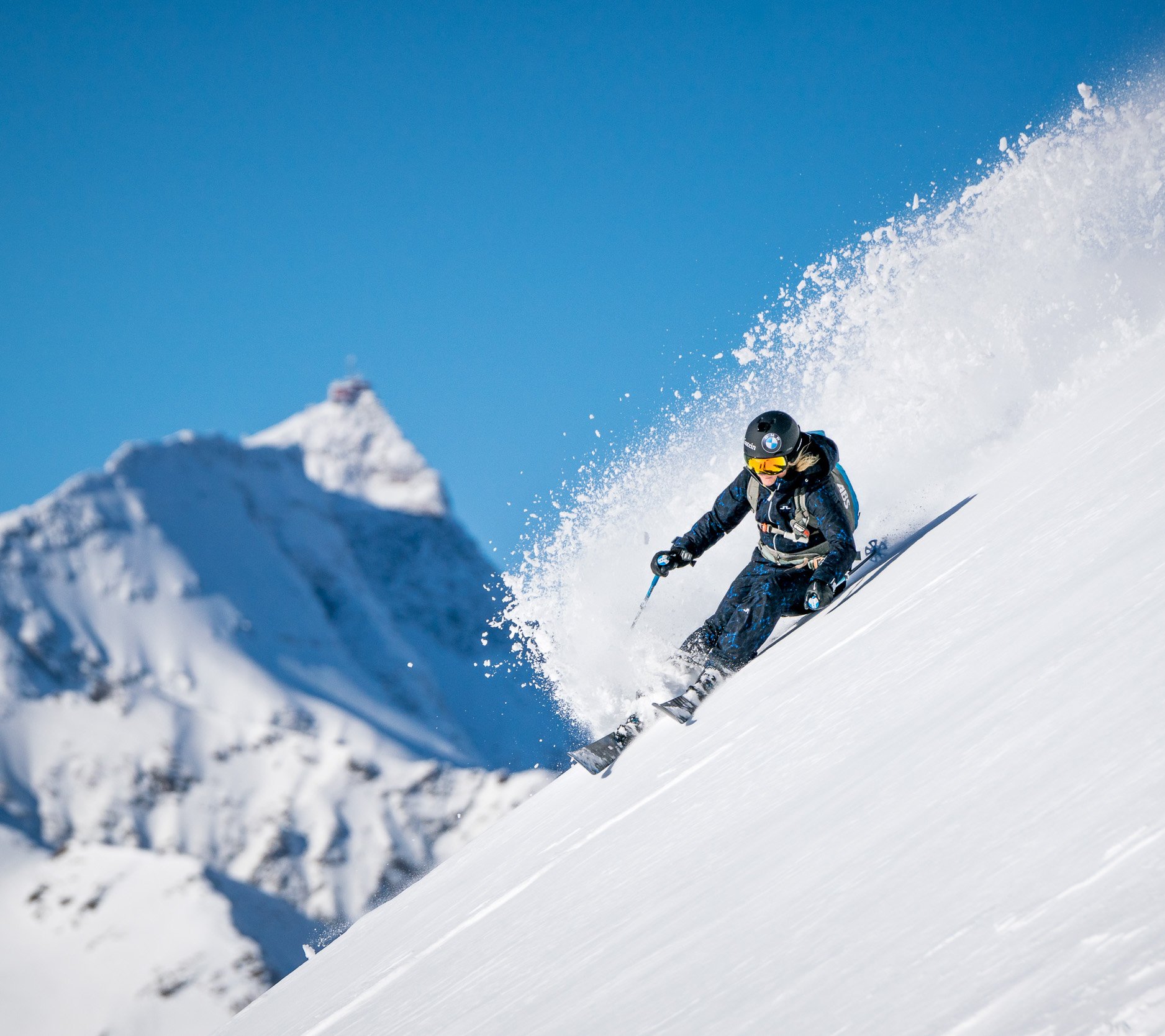 Freeriders descending in deep snow